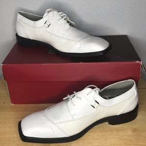 All white with black bottom dress shoe!